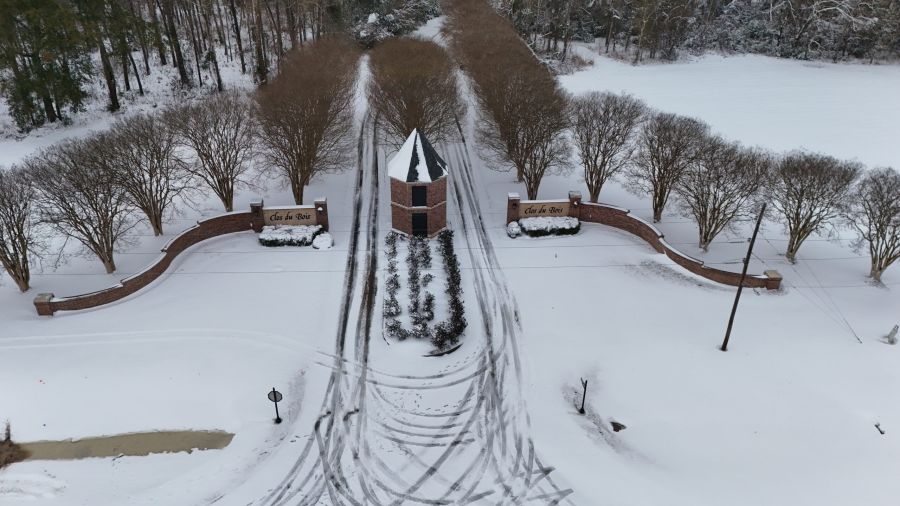snow covered subdivision entrance