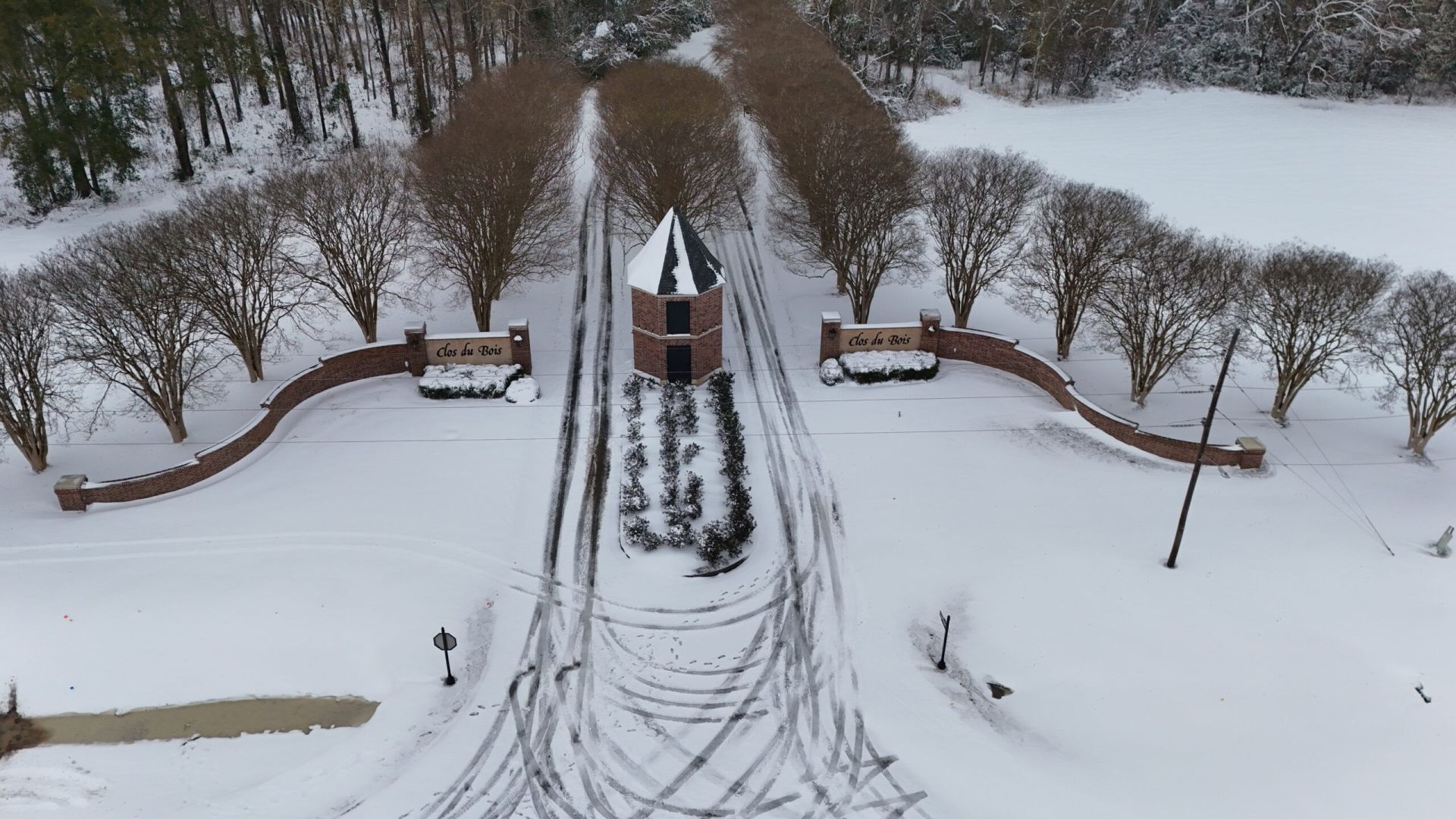 snow covered subdivision entrance