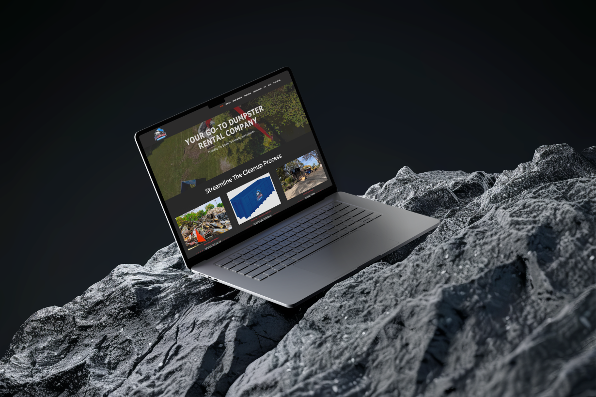 Freedom Dumpsters Website on laptop